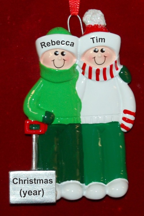 Snow Shovel Couple Christmas Ornament by Russell Rhodes