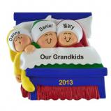 3 Grandkids Snuggled in Bed Christmas Ornament Personalized by RussellRhodes.com