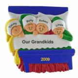 4 Grandkids Snuggled in Bed Christmas Ornament Personalized by RussellRhodes.com