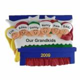 6 Grandkids Snuggled in Bed Christmas Ornament Personalized by Russell Rhodes