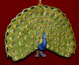 Peacock Christmas Ornament by Russell Rhodes